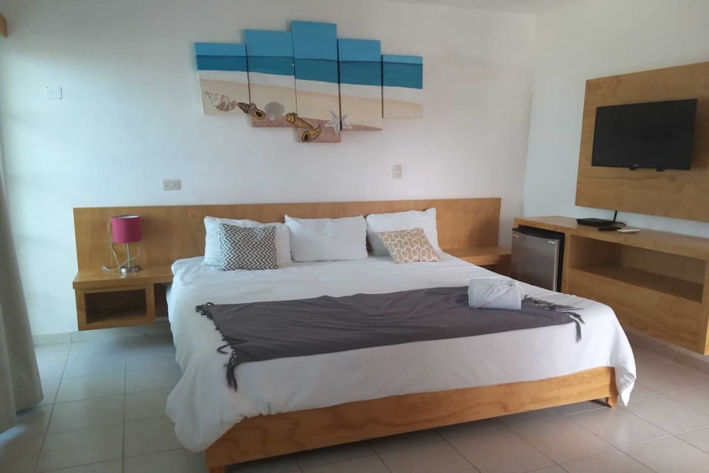 Habitación con camas dobles del Hotel & Beach Club Ojo de Agua