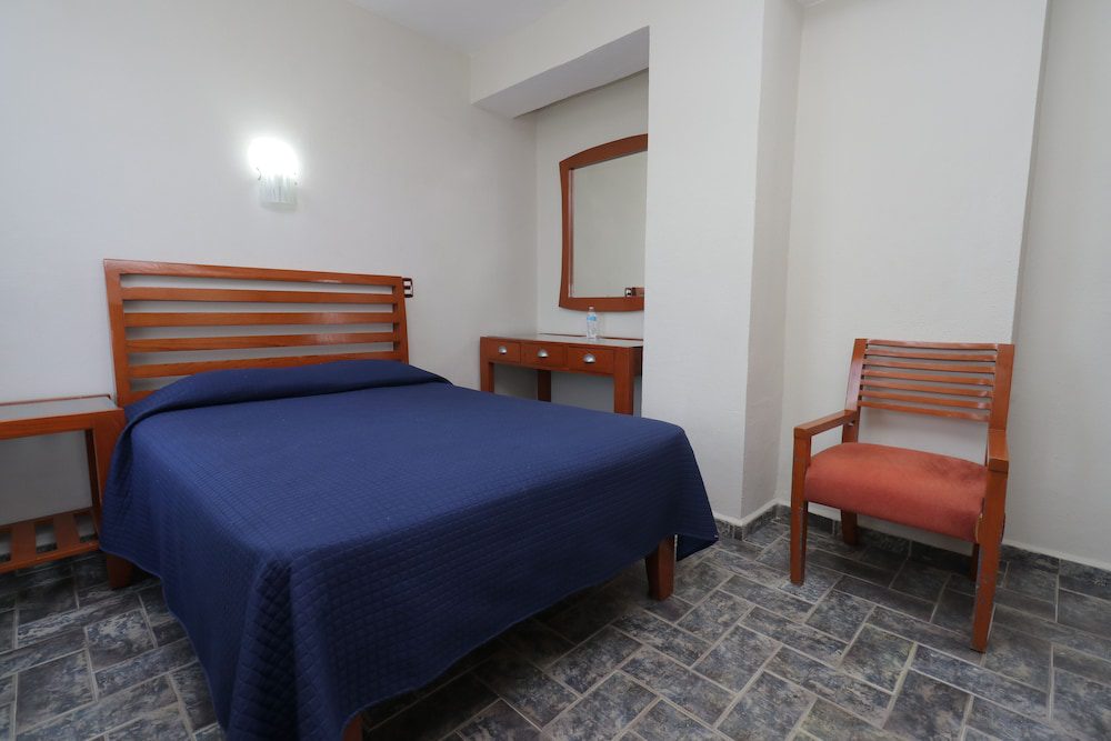 Habitación con cama doble de Hotel Soberanis en Cancún