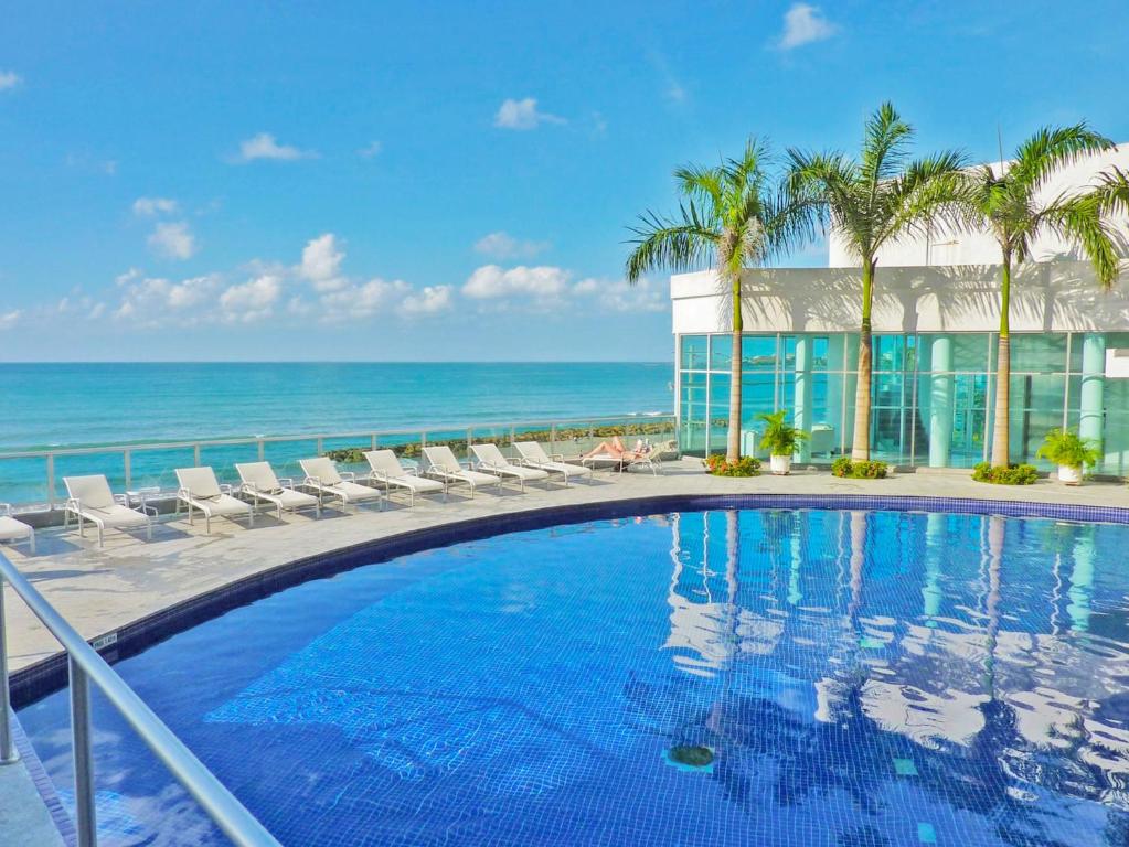 Banner Principal Apartamentos Frente al Mar Palmetto by CR