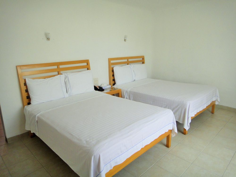 Habitación con dos camas de Sotavento Hotel & Yacht Club en Cancún
