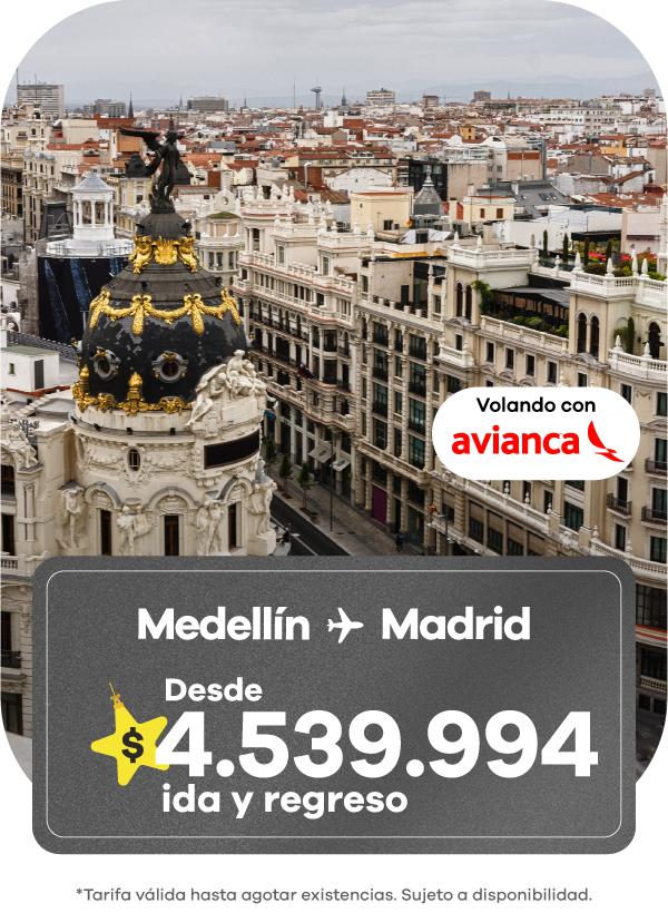 Banner de oferta de vuelo Medellín a Madrid con Avianca, precio desde $4.539.994 ida y regreso, vista aérea del edificio Metrópolis en Madrid.