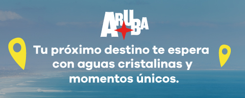Aruba travel banner with ocean background, two yellow map pins, and Spanish slogan about crystal-clear waters and unique moments.