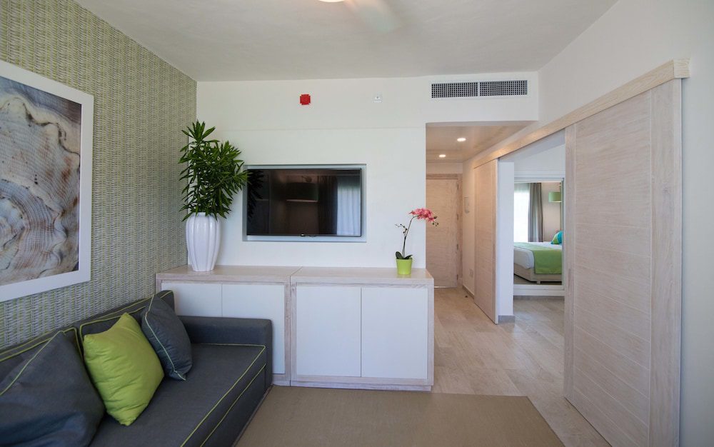 Grand Sirenis Punta Cana Resort & Aquagames: área de sala de estar