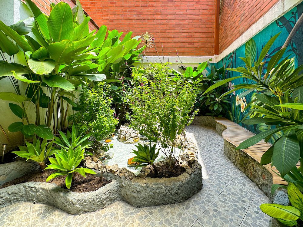 Solar Hotel Casa Laureles en Medellín: área de sala de estar
